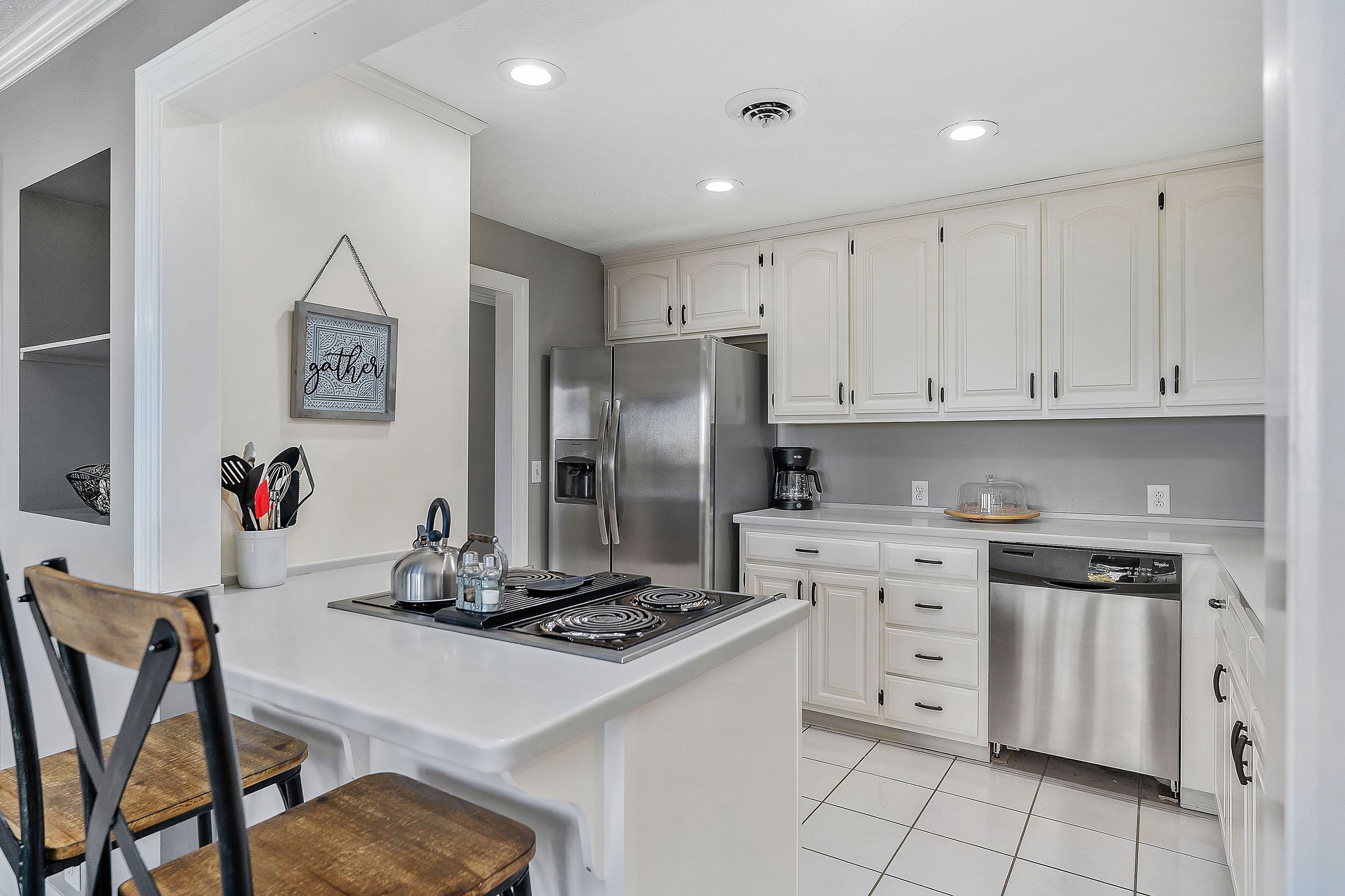 1824 Puckett Point Road Smithville, TN 37166 - Photo 16 of 53 a kitchen with stainless steel appliances granite countertop a stove refrigerator sink and cabinets
