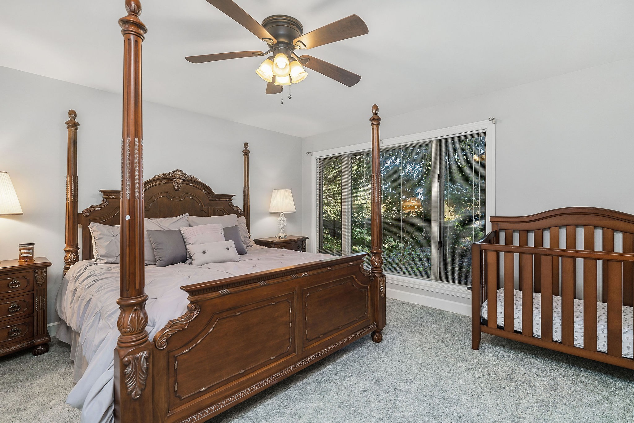 1824 Puckett Point Road Smithville, TN 37166 - Photo 28 of 53 a bed room with a bed and a chandelier