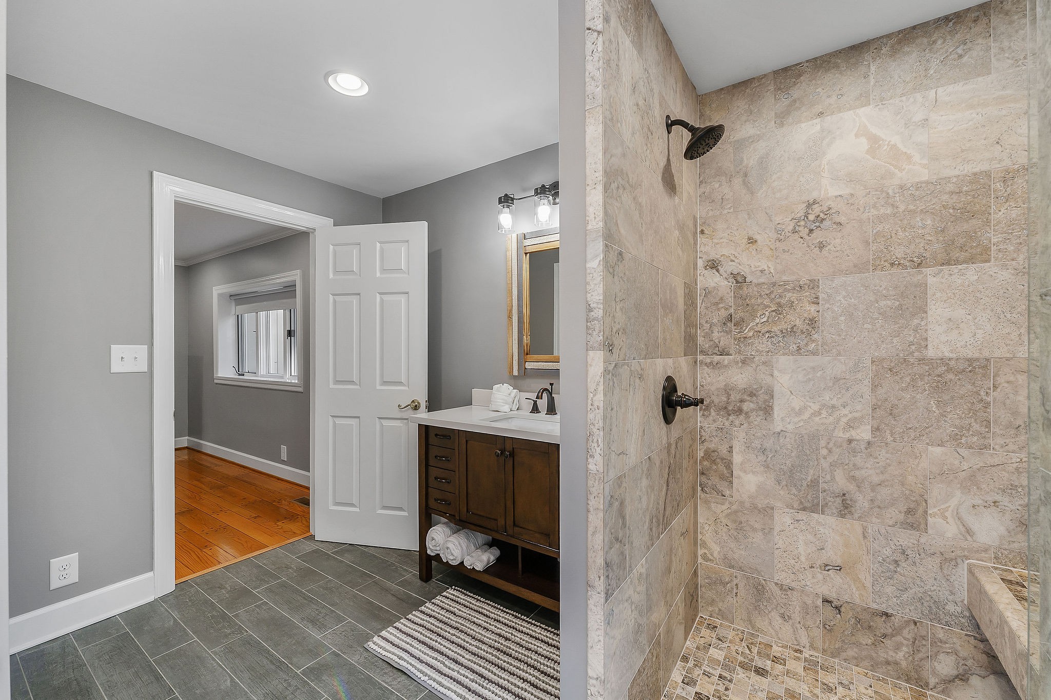 1824 Puckett Point Road Smithville, TN 37166 - Photo 36 of 53 a bathroom with a sink a toilet and shower