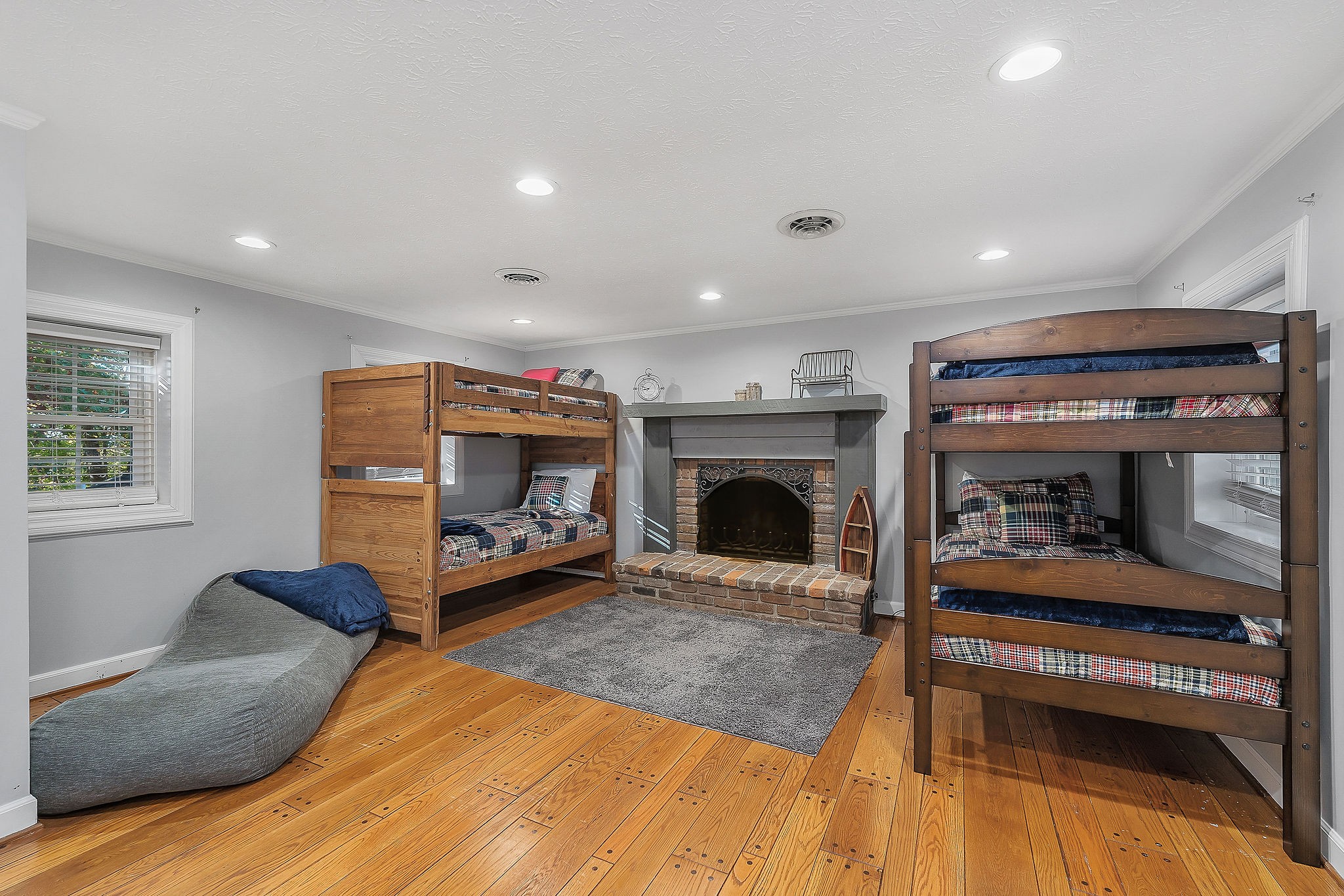 1824 Puckett Point Road Smithville, TN 37166 - Photo 38 of 53 a living room with furniture and a fireplace