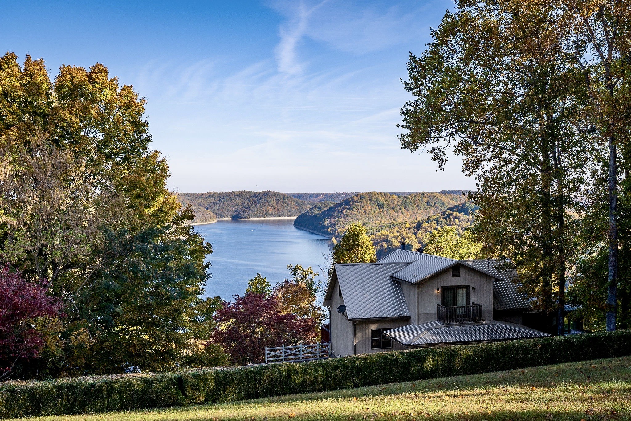 1824 Puckett Point Road Smithville, TN 37166 - Photo 47 of 53 a front view of a house with a garden and lake view