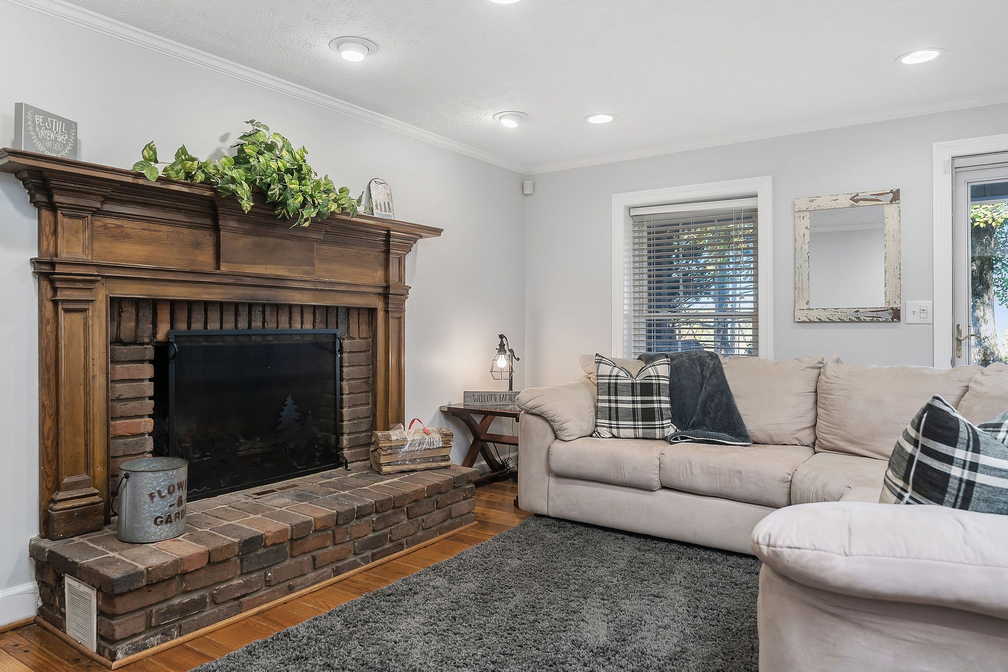 1824 Puckett Point Road Smithville, TN 37166 - Photo 6 of 53 a living room with furniture and a fireplace