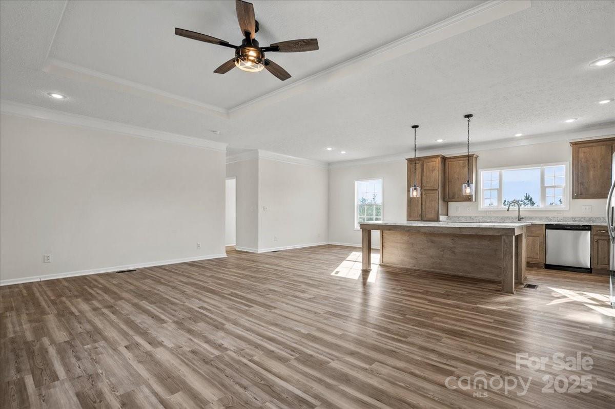 5257 Raleys Mill Road Bethune, SC 29009 - Photo 12 of 48 a view of a kitchen with kitchen island a sink stainless steel appliances and cabinets