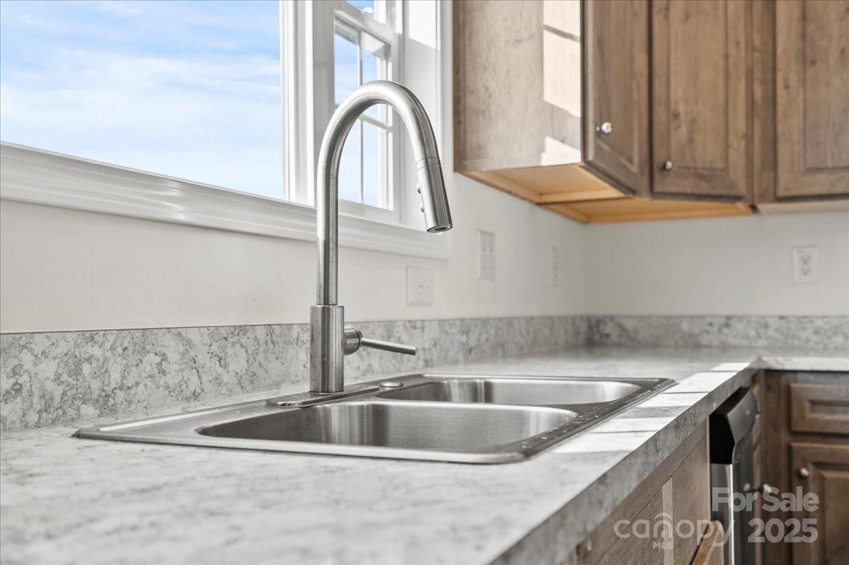 5257 Raleys Mill Road Bethune, SC 29009 - Photo 19 of 48 a close view of sink and tap