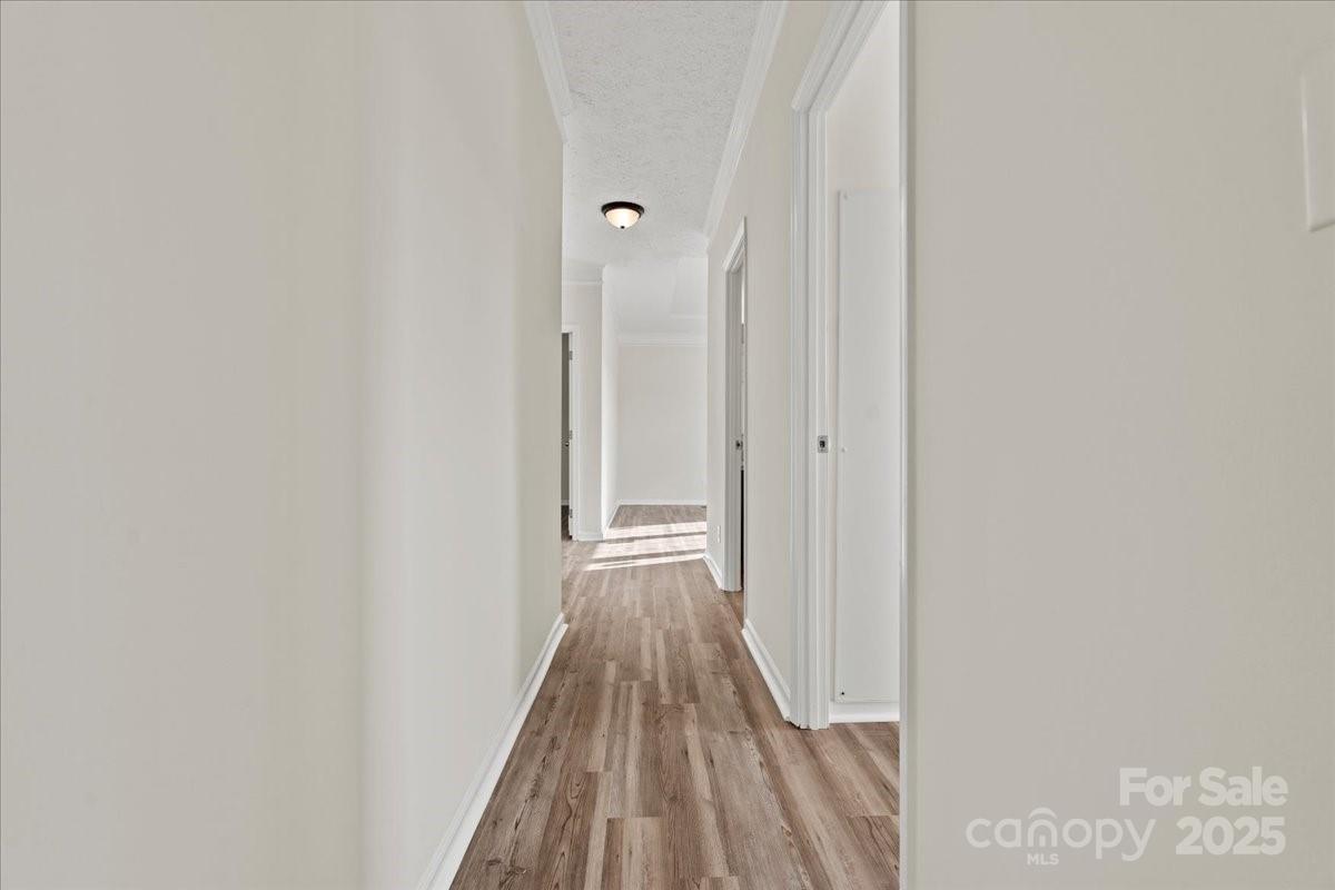 5257 Raleys Mill Road Bethune, SC 29009 - Photo 29 of 48 a view of a hallway with wooden floor