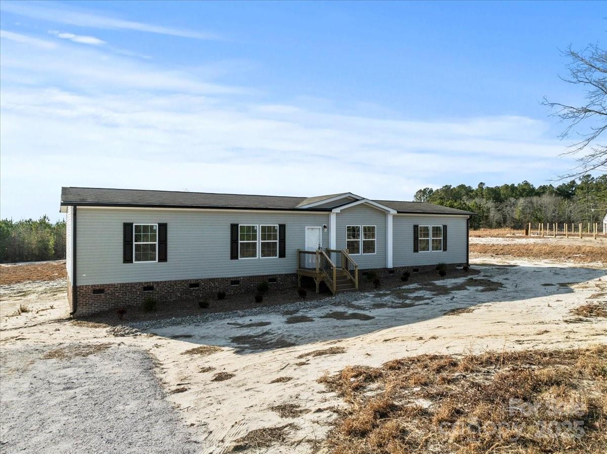 5257 Raleys Mill Road Bethune, SC 29009 - Photo 46 of 48 a view of a house with a yard