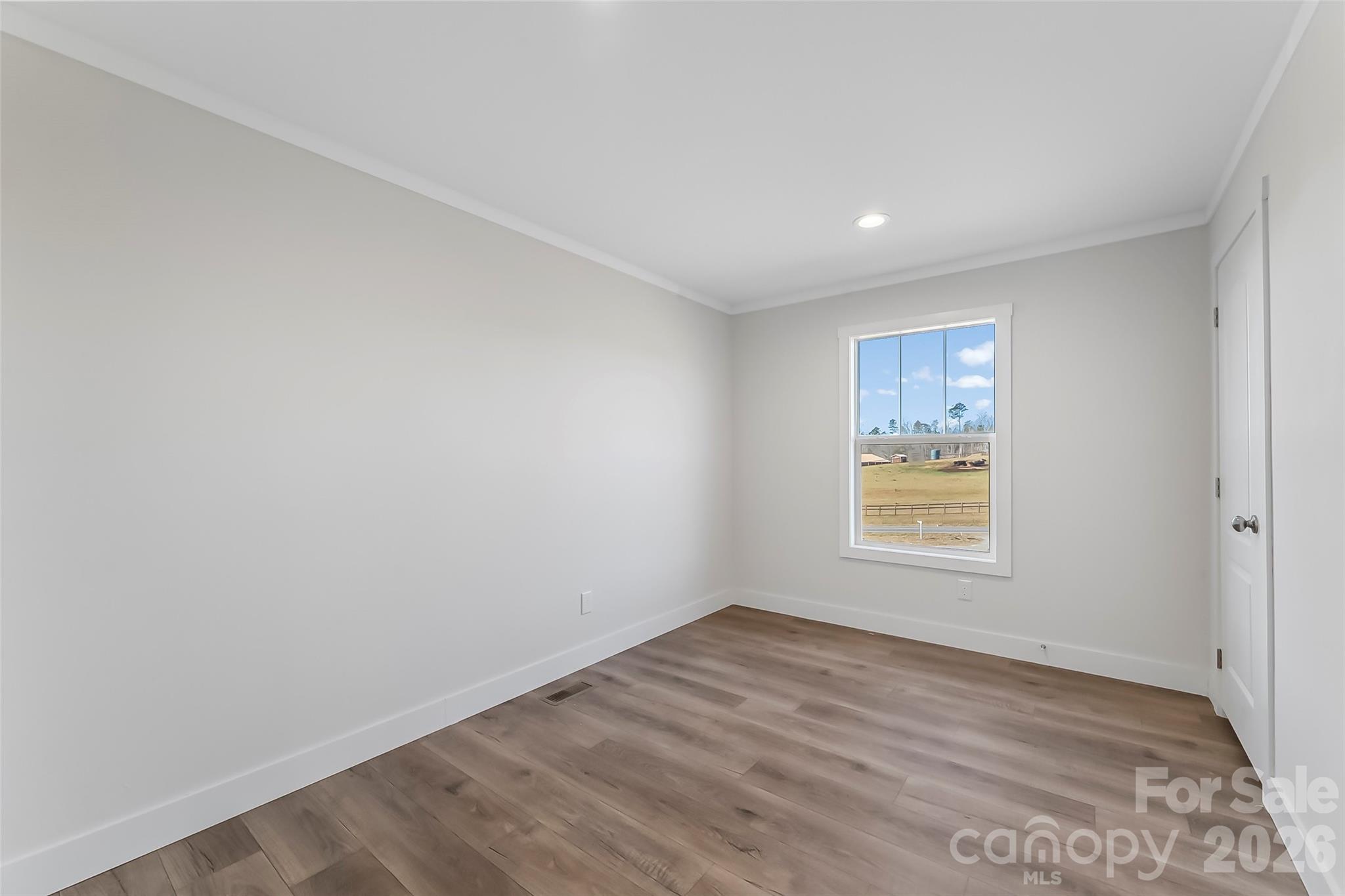1710 Hudlow Road Forest City, NC 28043 - Photo 16 of 23 an empty room with a window