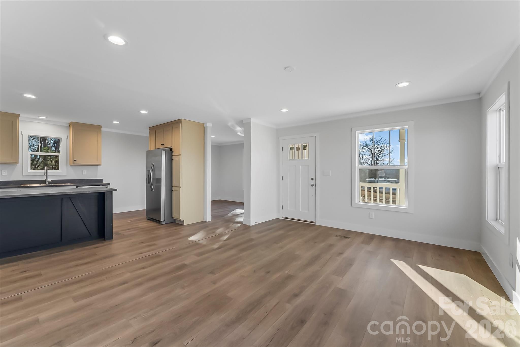 1710 Hudlow Road Forest City, NC 28043 - Photo 6 of 23 a view of a kitchen with a sink and a refrigerator