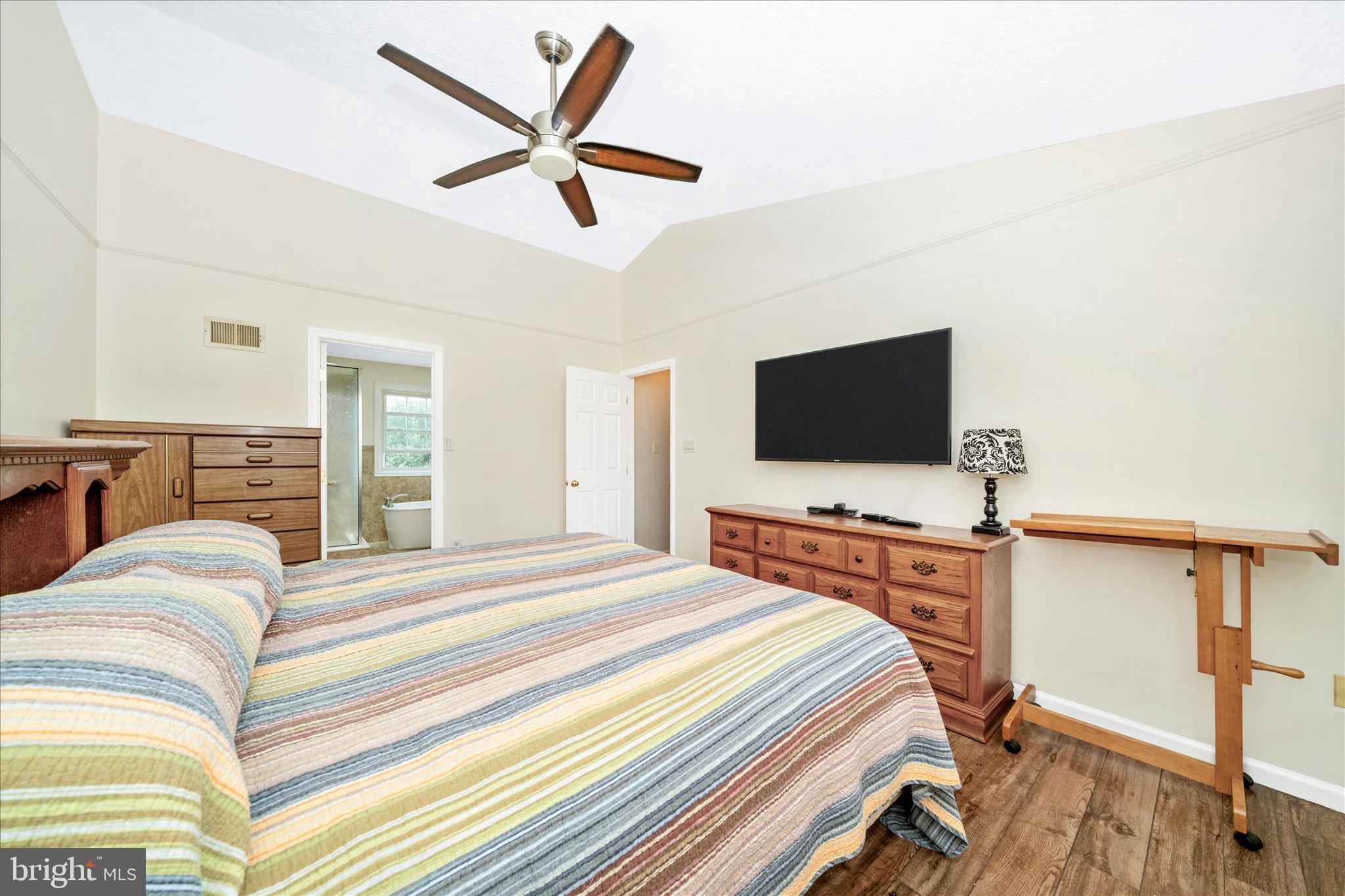 9534 Liberty Road Frederick, MD 21701 - Photo 31 of 70 a bedroom with a bed and a flat screen tv