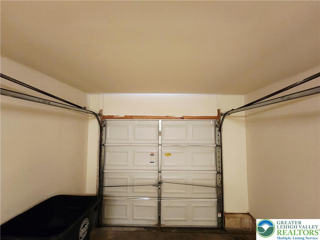 8513 Gateway Road Breinigsville, PA 18031 - Photo 41 of 45 Secure parking and ample storage space are provided by the functional garage.