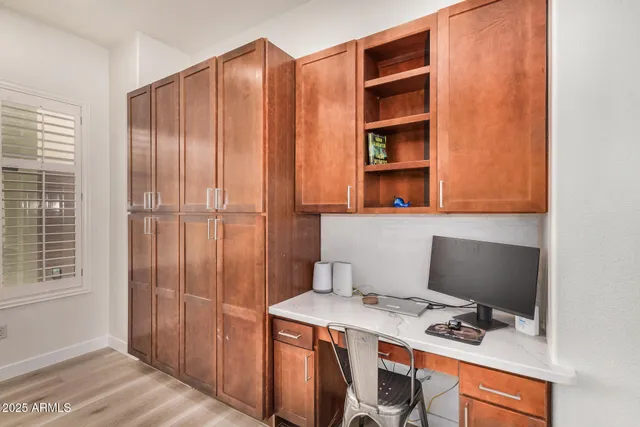 a workspace with cabinets