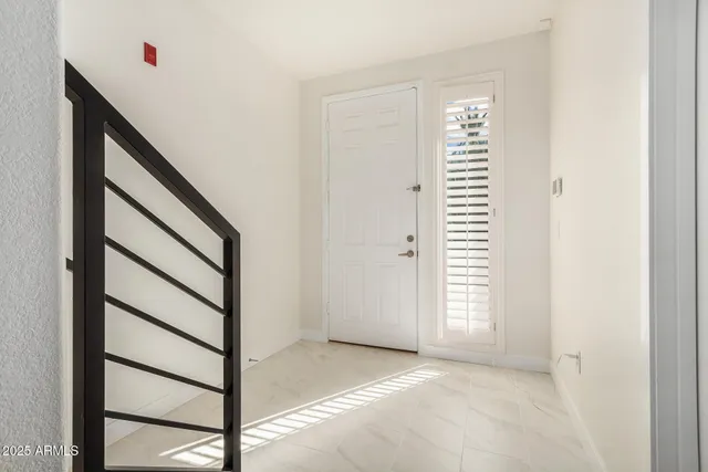 a view of an entryway with staircase