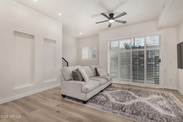 a living room with furniture and window
