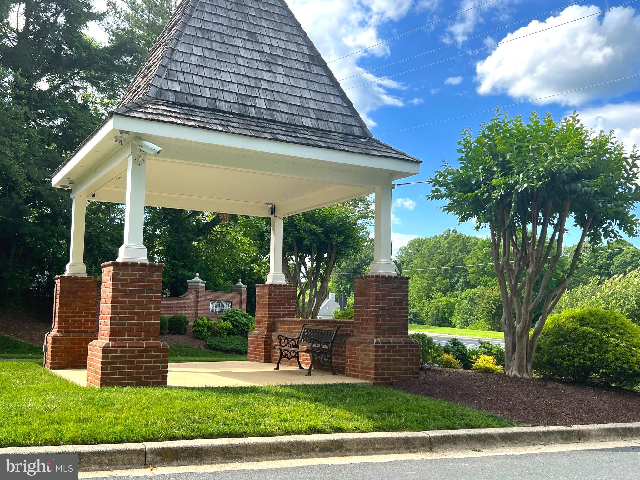 6450 Meadowlark Drive Dunkirk, MD 20754 - Photo 13 of 36 a front view of a house with garden