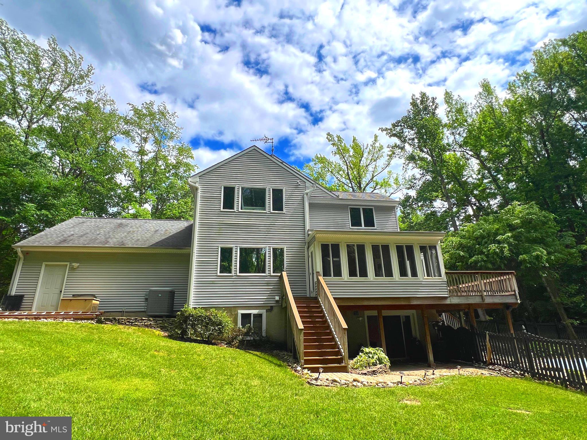 6450 Meadowlark Drive Dunkirk, MD 20754 - Photo 2 of 36 a front view of a house with a yard