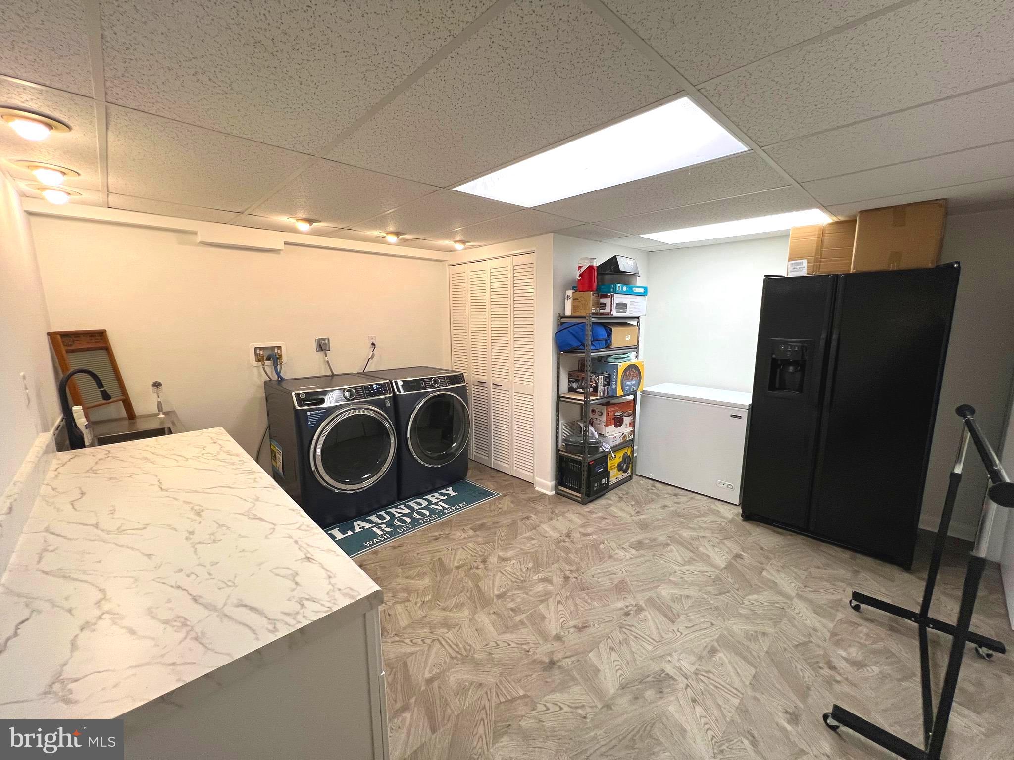 6450 Meadowlark Drive Dunkirk, MD 20754 - Photo 21 of 36 a view of a storage & utility room with washer and dryer