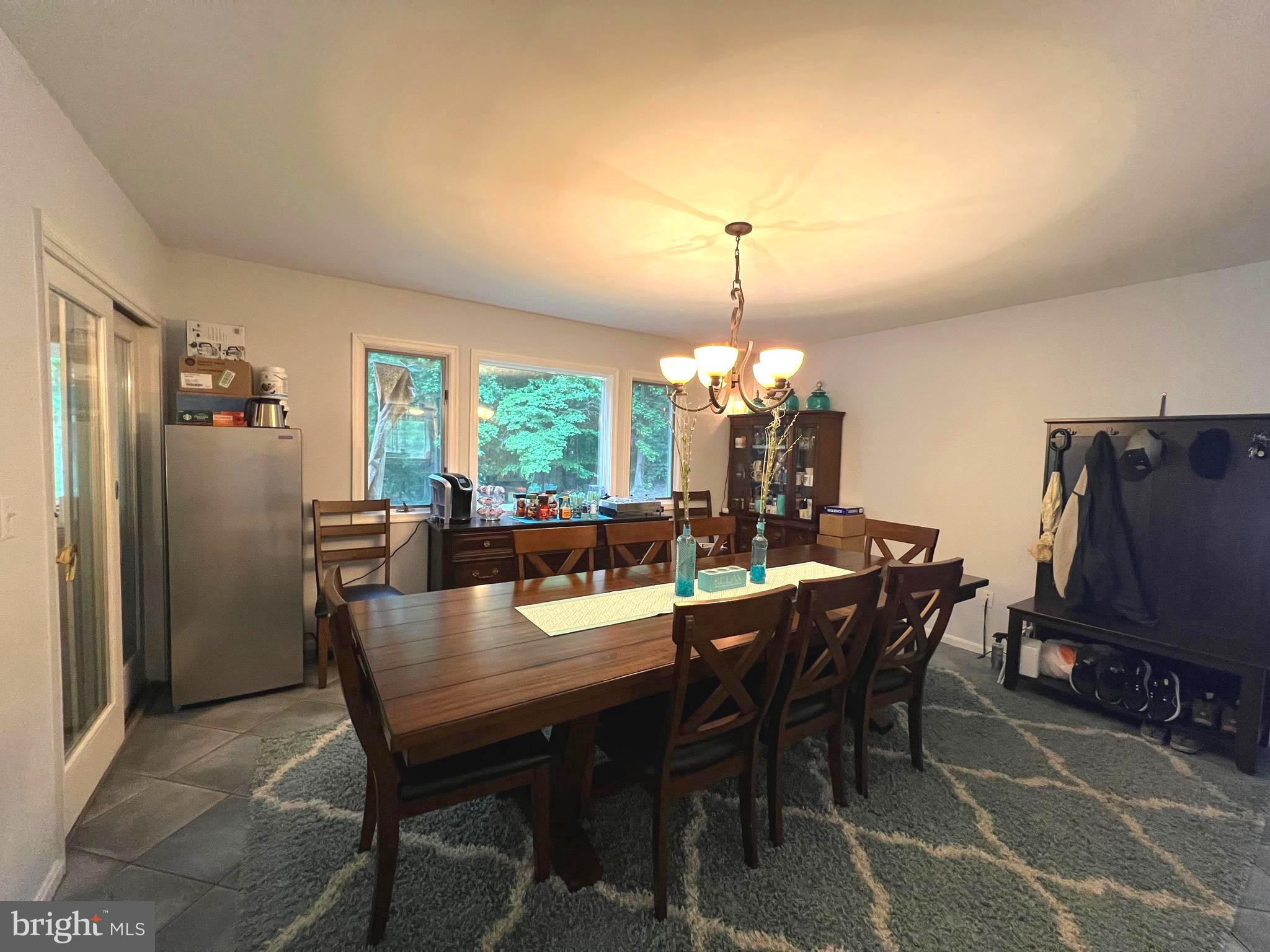 6450 Meadowlark Drive Dunkirk, MD 20754 - Photo 32 of 36 a view of a dining room with furniture