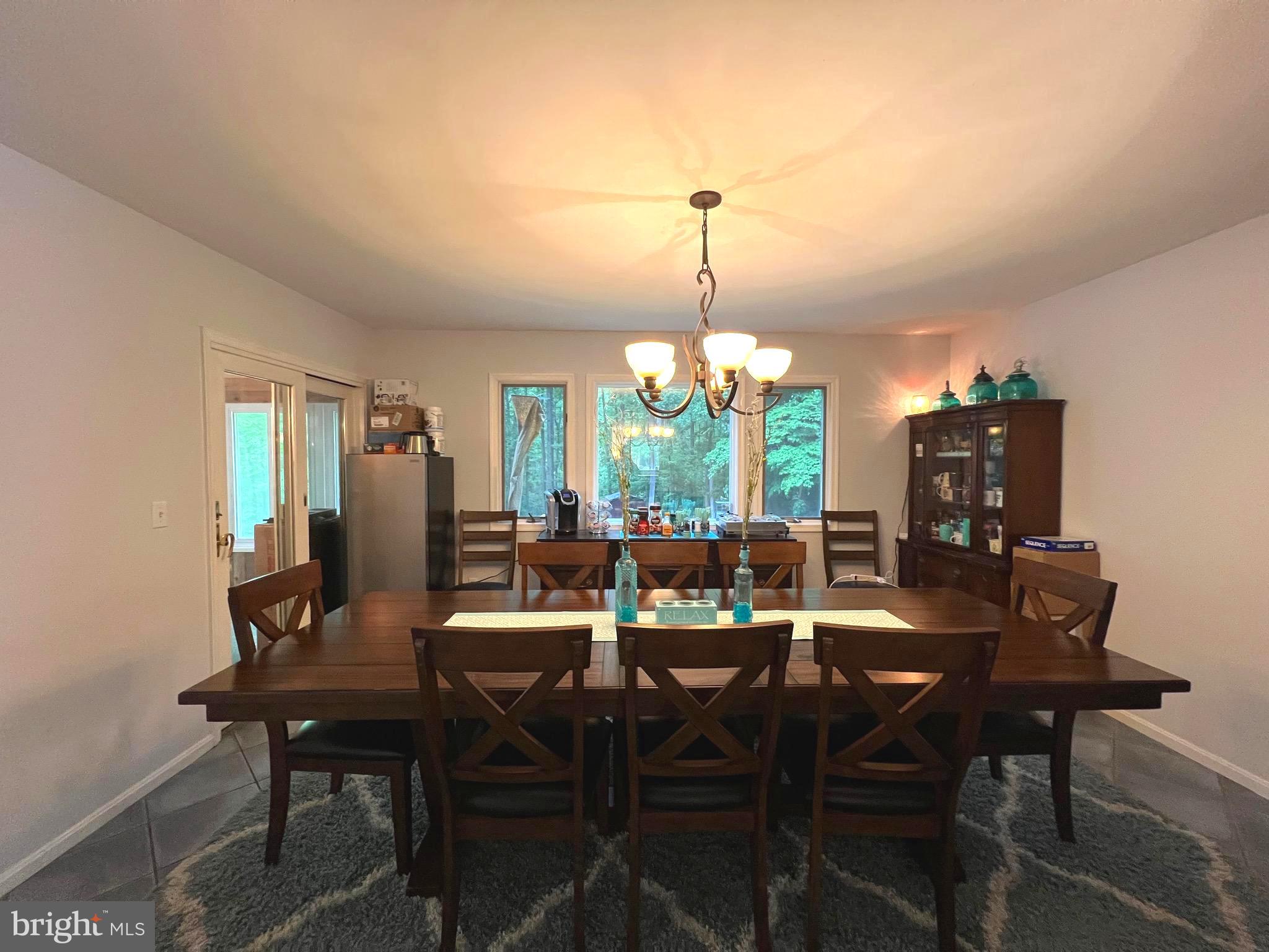 6450 Meadowlark Drive Dunkirk, MD 20754 - Photo 33 of 36 a view of a dining room with furniture