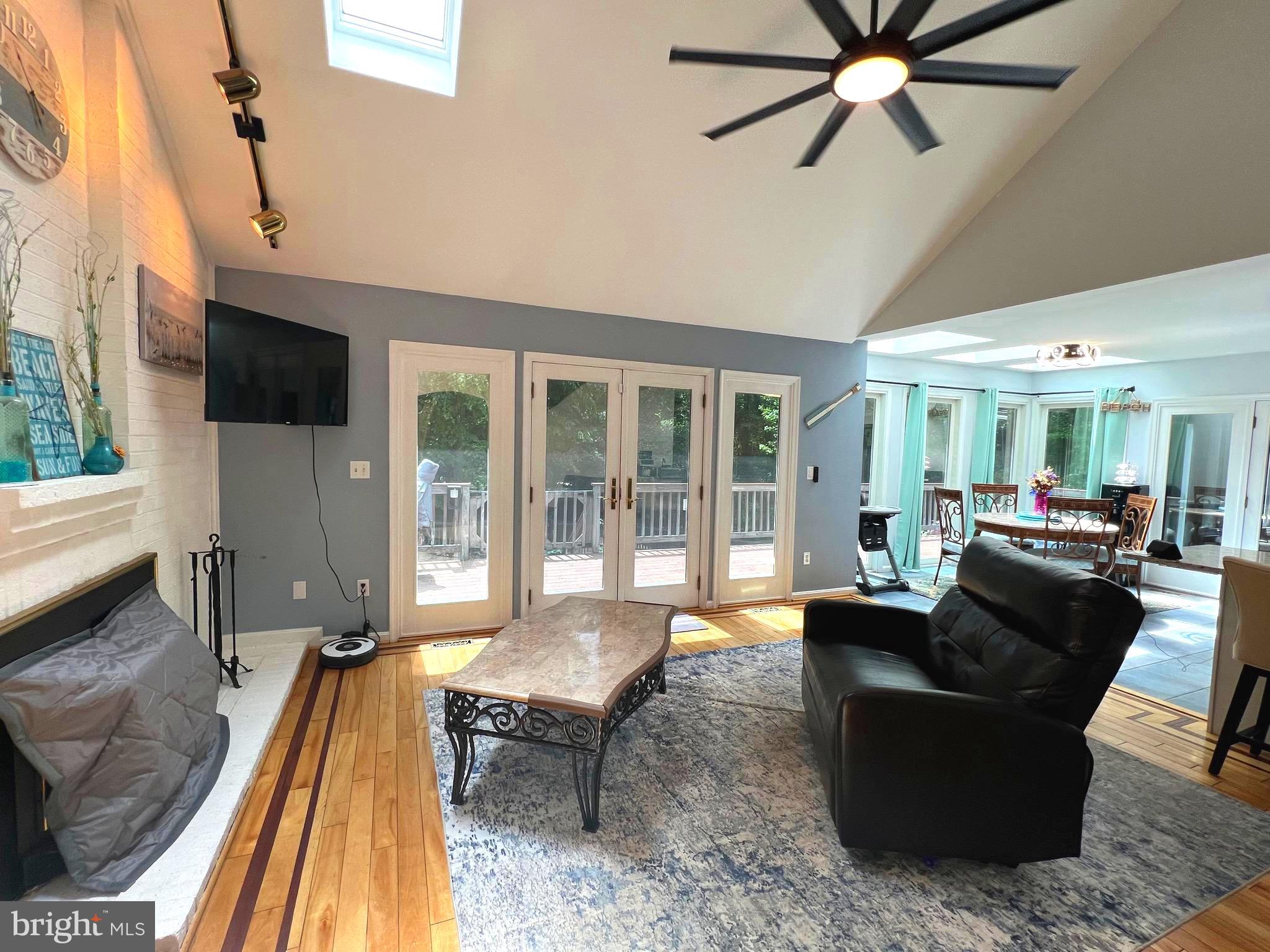 6450 Meadowlark Drive Dunkirk, MD 20754 - Photo 5 of 36 a living room with furniture and a flat screen tv