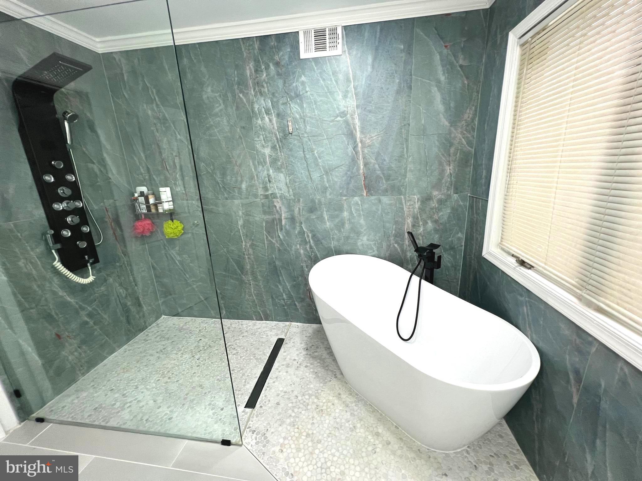 6450 Meadowlark Drive Dunkirk, MD 20754 - Photo 10 of 36 a bathroom with a sink and mirror