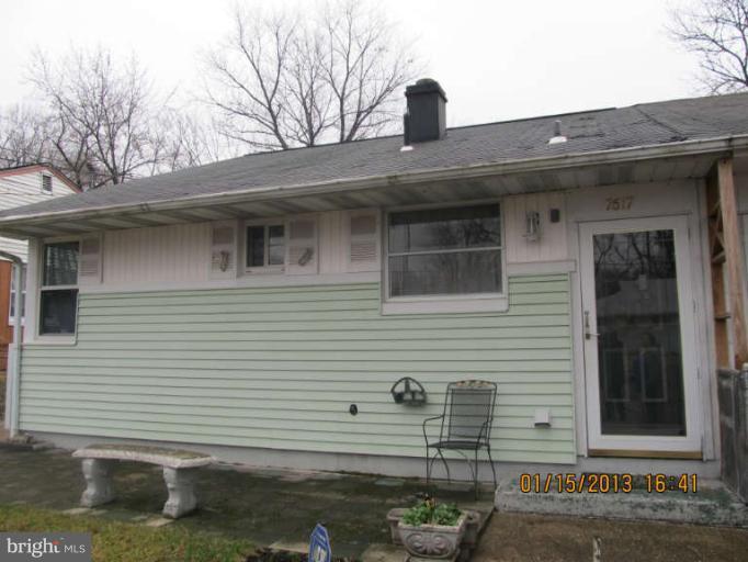 7617 Oxman Road Hyattsville, MD 20785 - Photo 1 of 9 a front view of a house with a yard