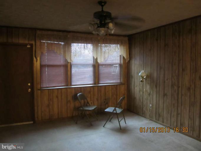 7617 Oxman Road Hyattsville, MD 20785 - Photo 3 of 9 a workspace room with windows