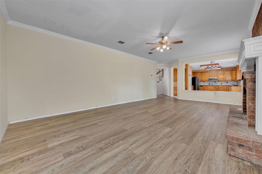 1409 Jackson Road Keller, TX 76262 - Photo 13 of 35 wooden floor in an empty room with a window
