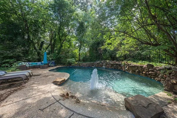 a view of a backyard with green space