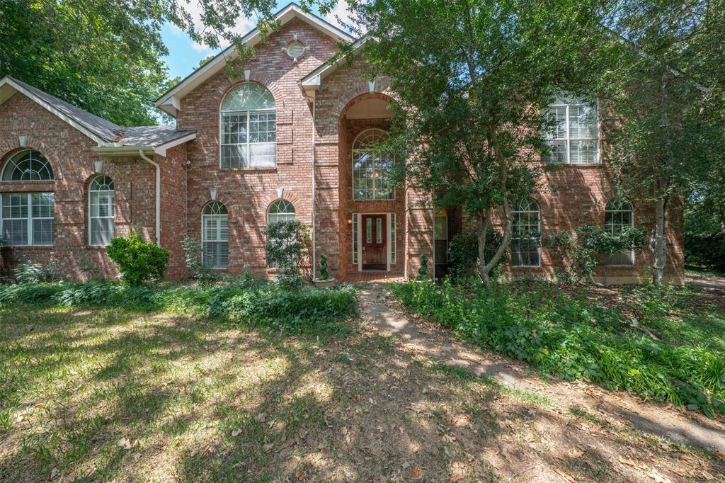 1409 Jackson Road Keller, TX 76262 - Photo 35 of 35 a front view of a house with garden