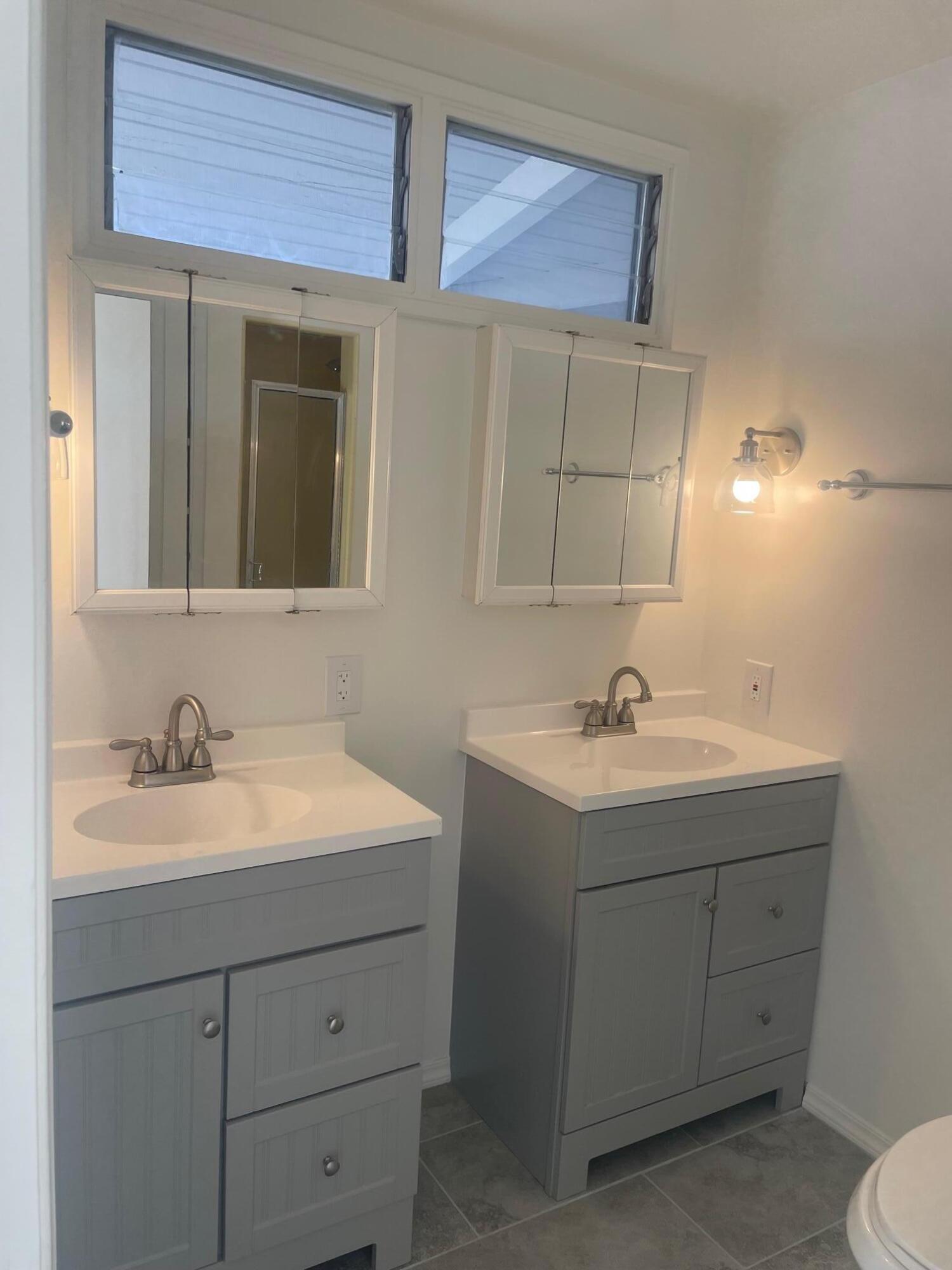 2630 North Biskra Road Palm Springs, CA 92262 - Photo 8 of 10 a bathroom with a sink and a mirror