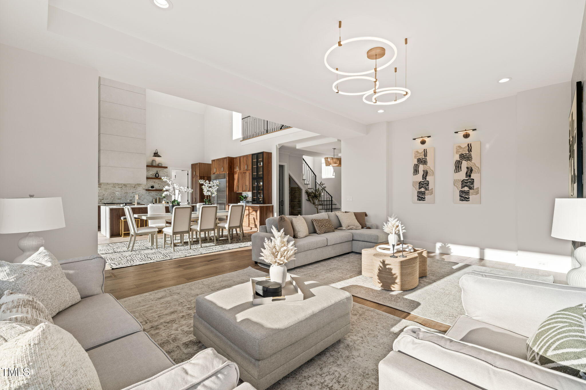 9009 Meadow Pointe Court Wake Forest, NC 27587 - Photo 16 of 76 a living room with furniture kitchen view and a large window