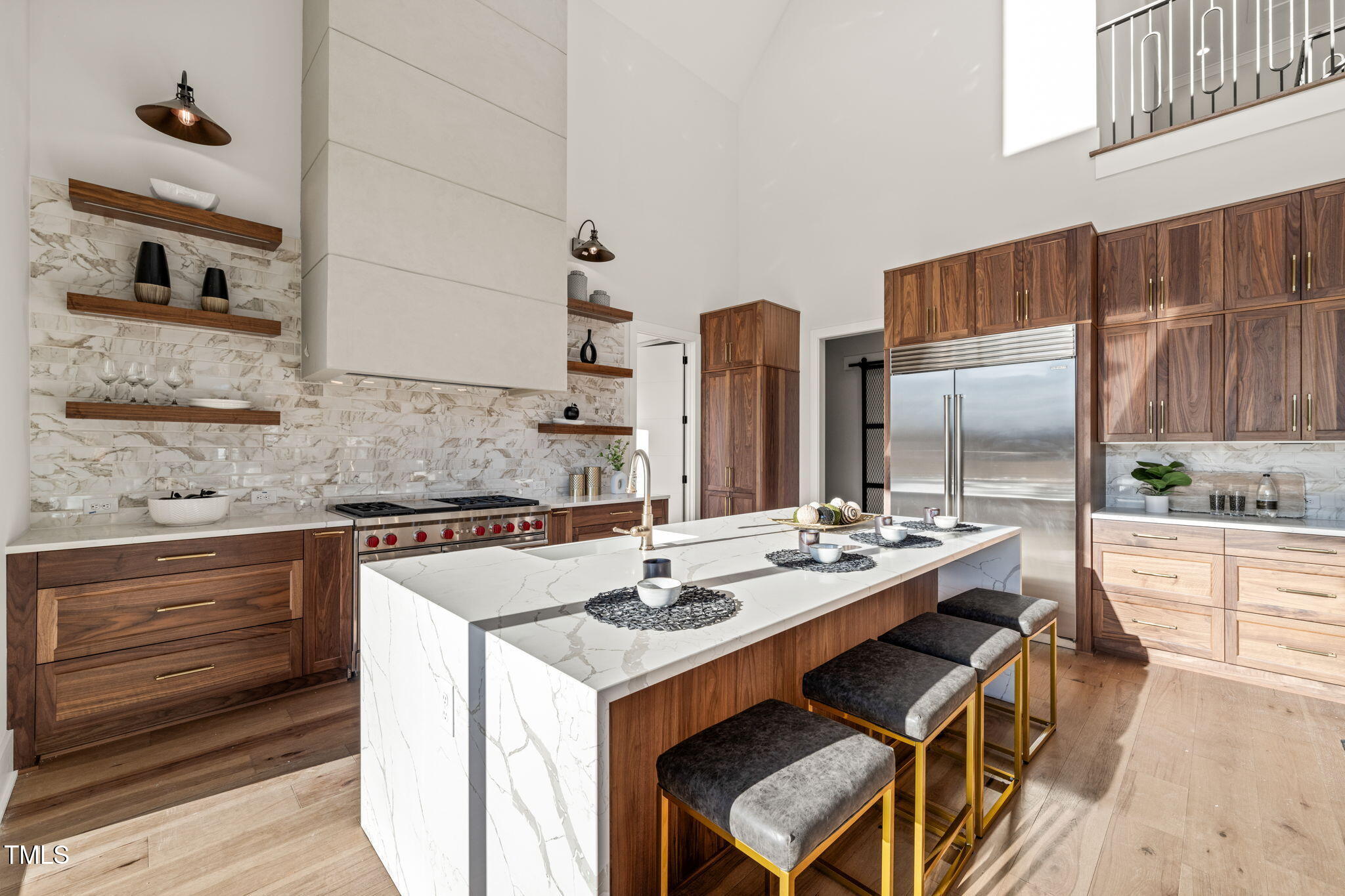 9009 Meadow Pointe Court Wake Forest, NC 27587 - Photo 21 of 76 a kitchen with stainless steel appliances kitchen island granite countertop a sink and cabinets