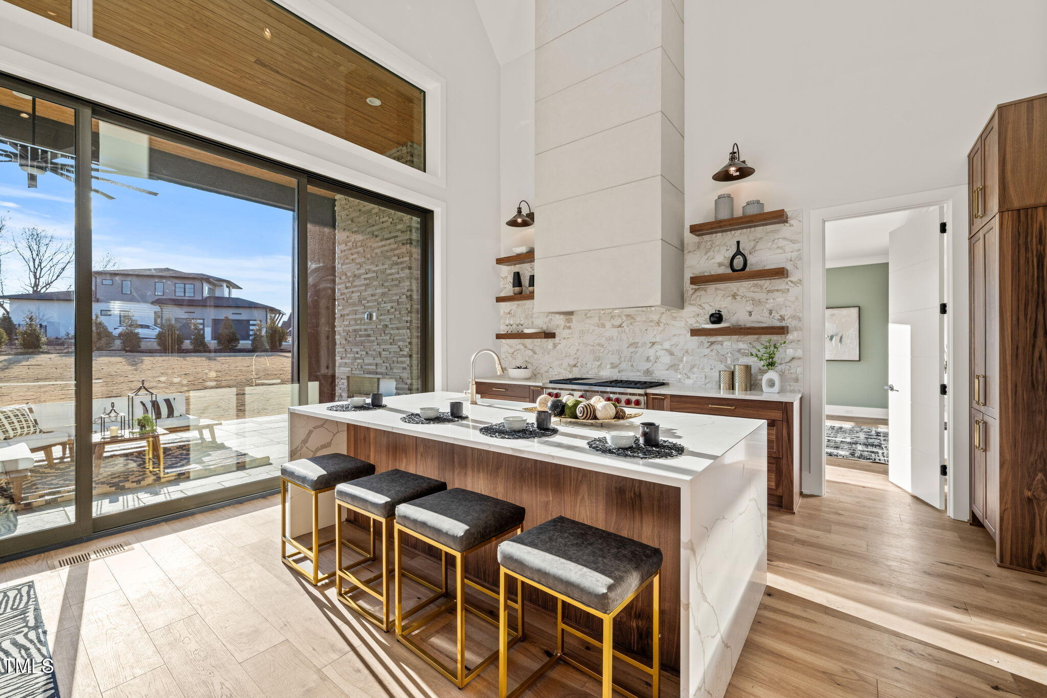 9009 Meadow Pointe Court Wake Forest, NC 27587 - Photo 22 of 76 a kitchen with a stove a sink and a refrigerator