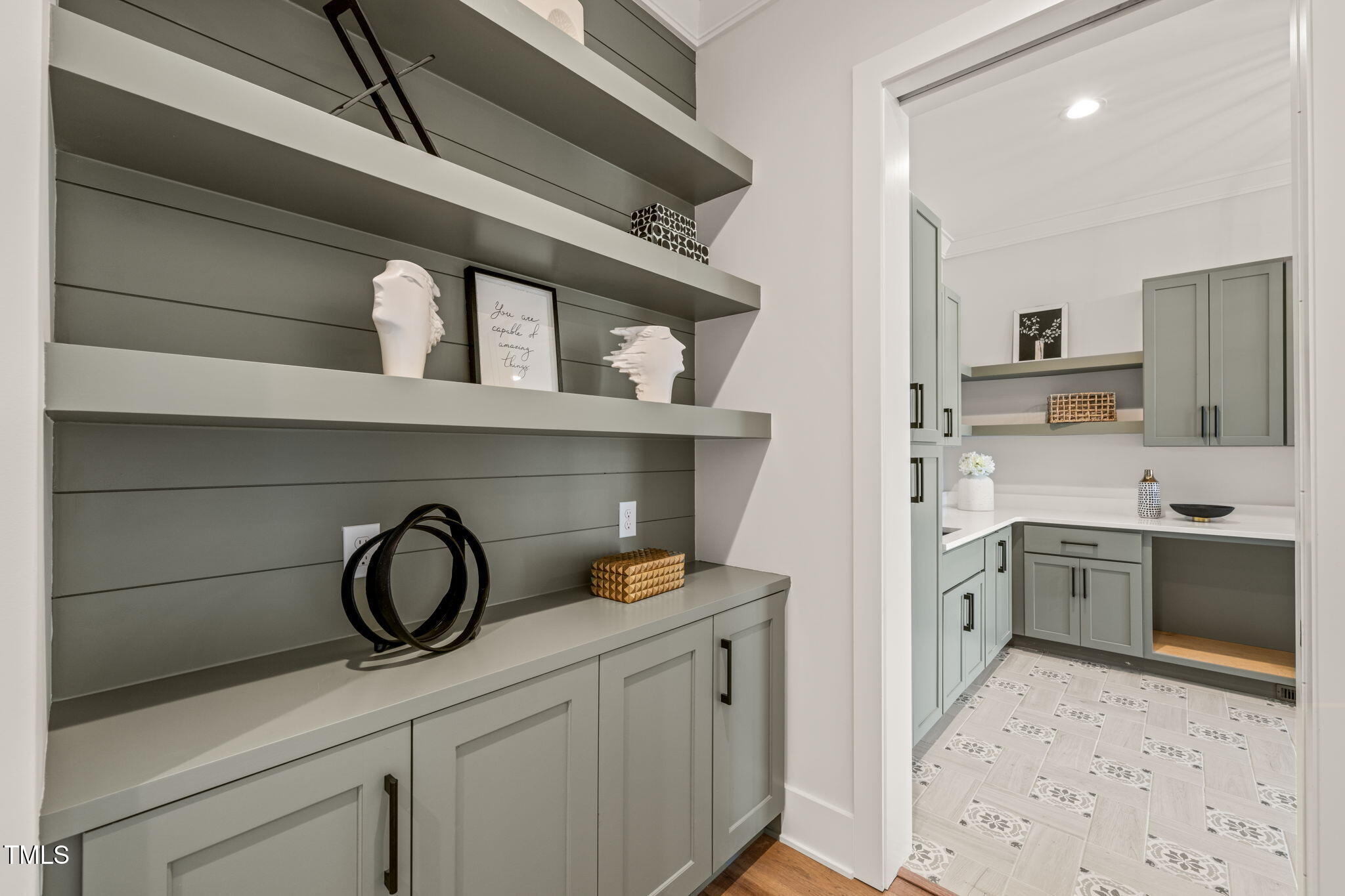 9009 Meadow Pointe Court Wake Forest, NC 27587 - Photo 30 of 76 a kitchen with a stove a sink and a refrigerator