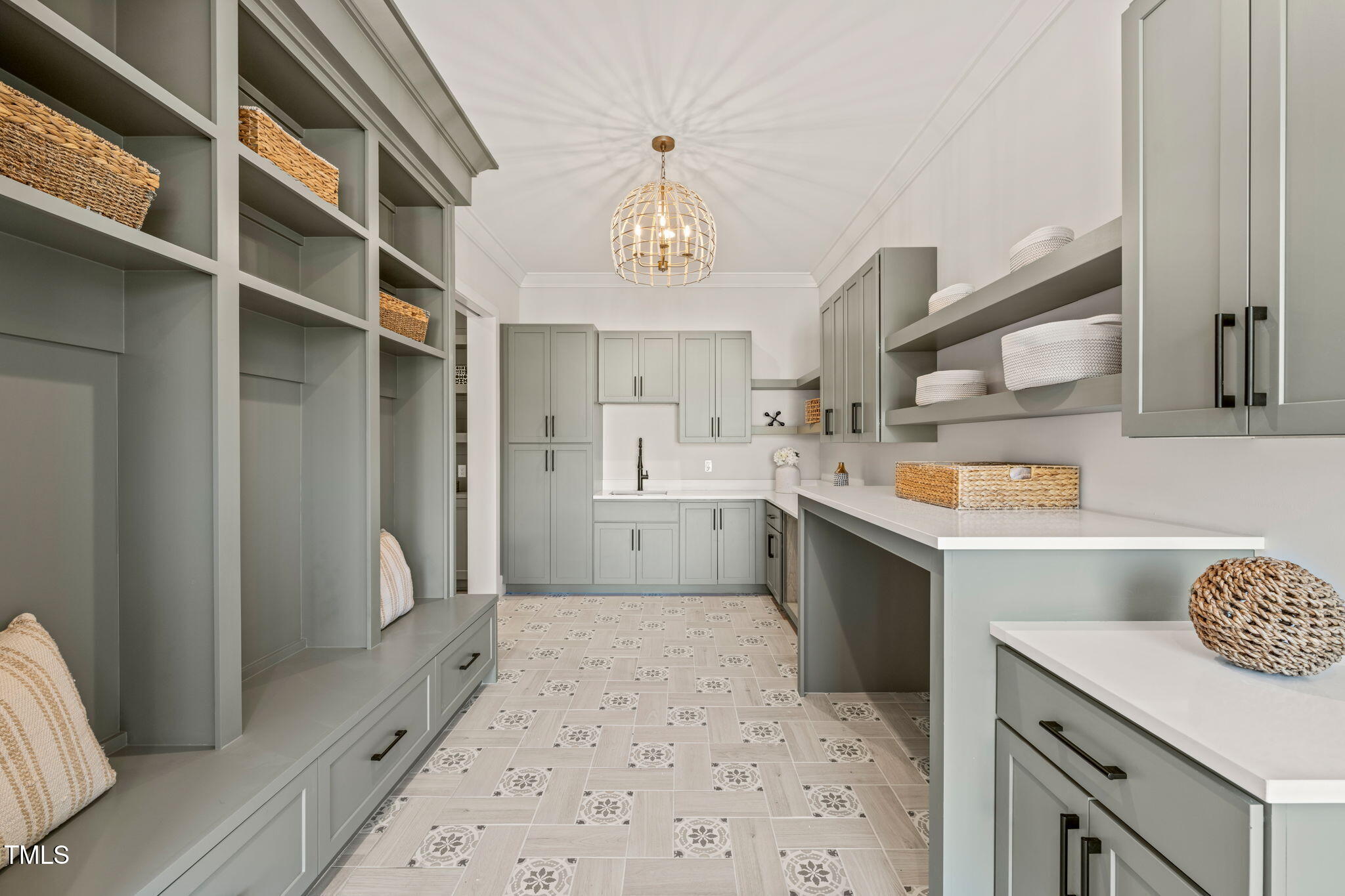 9009 Meadow Pointe Court Wake Forest, NC 27587 - Photo 31 of 76 a kitchen with a sink a counter top space and cabinets