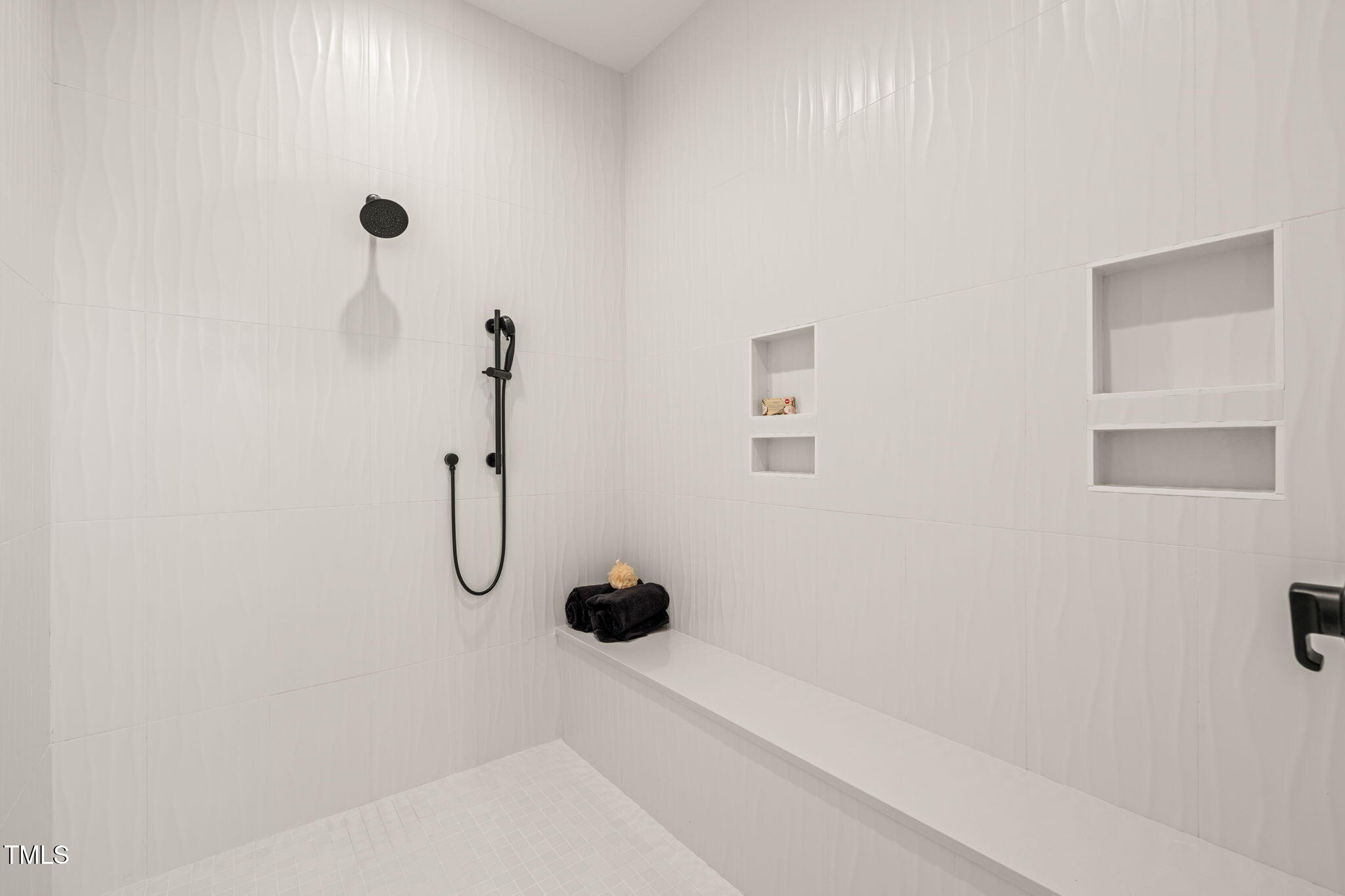 9009 Meadow Pointe Court Wake Forest, NC 27587 - Photo 39 of 76 a bathroom with a shower