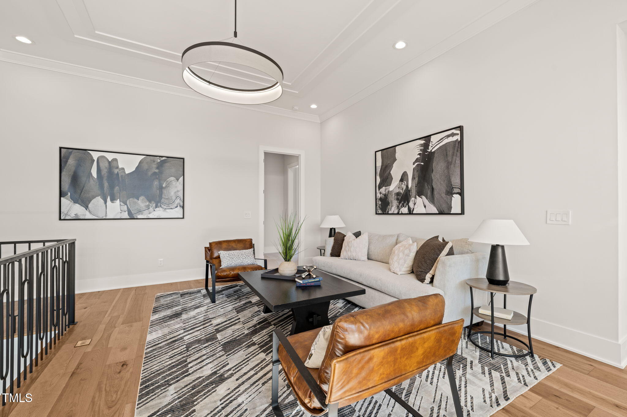 9009 Meadow Pointe Court Wake Forest, NC 27587 - Photo 43 of 76 a living room with furniture and wooden floor