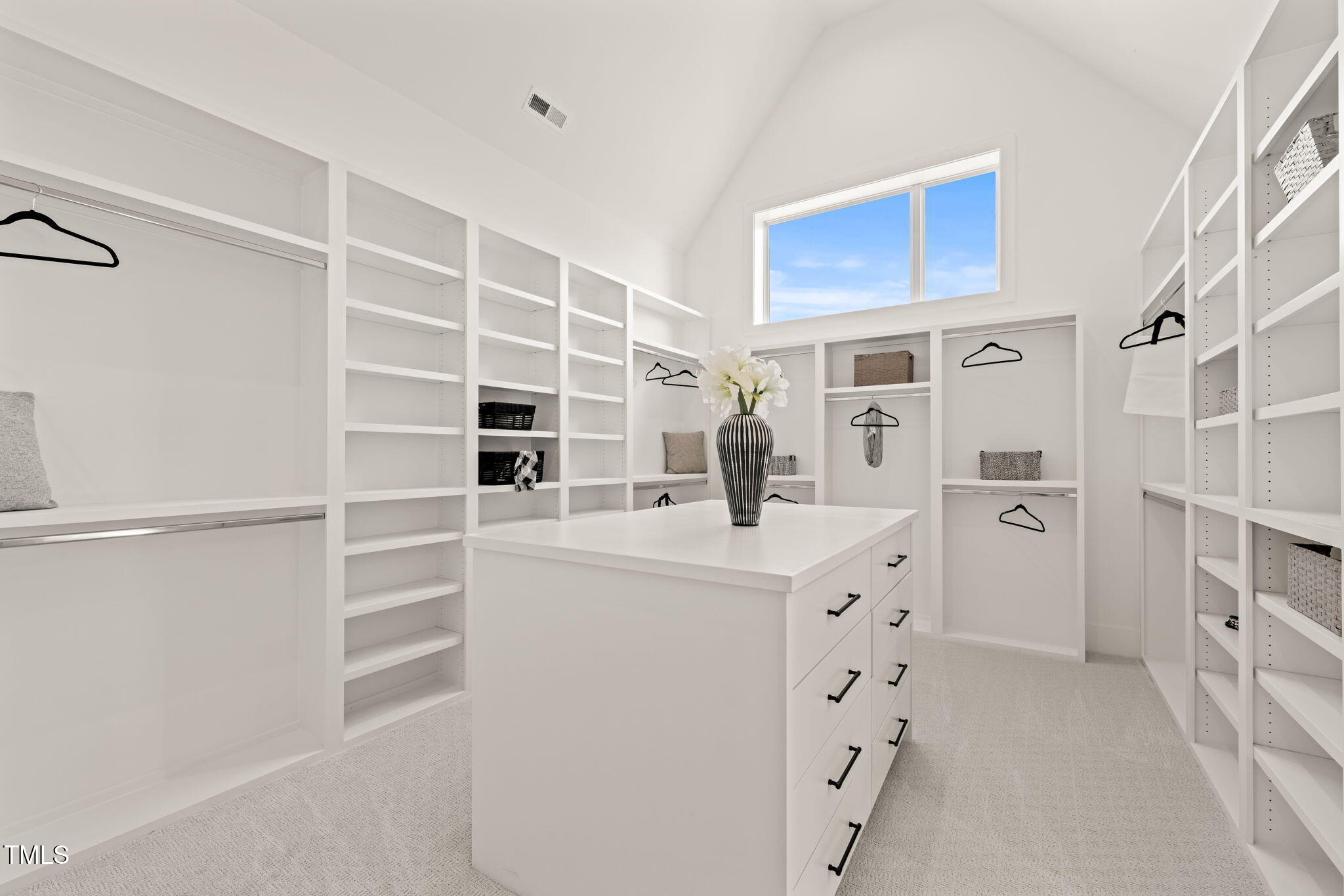 9009 Meadow Pointe Court Wake Forest, NC 27587 - Photo 50 of 76 a kitchen with cabinets and white appliances