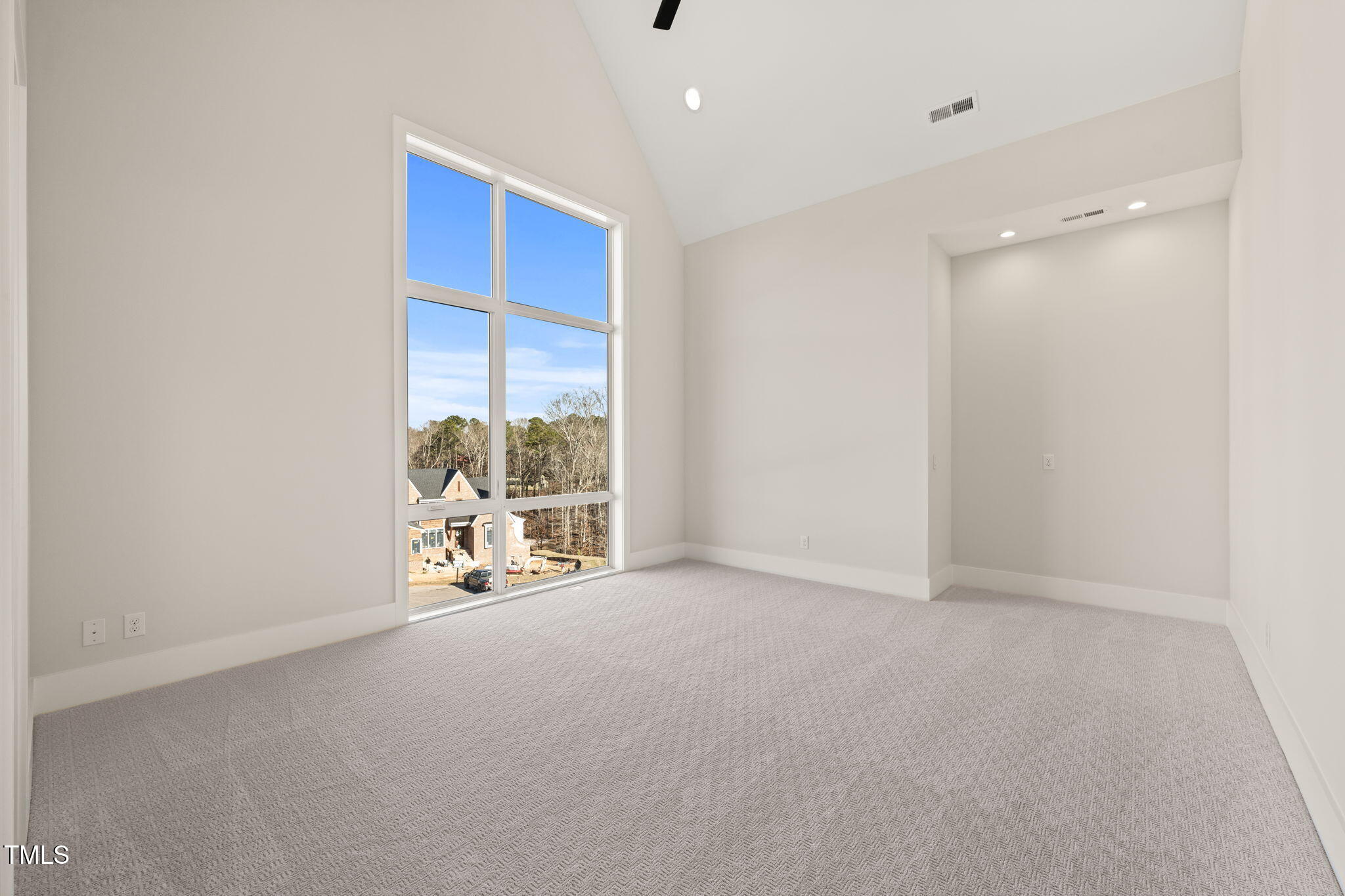 9009 Meadow Pointe Court Wake Forest, NC 27587 - Photo 51 of 76 a view of an empty room with a window