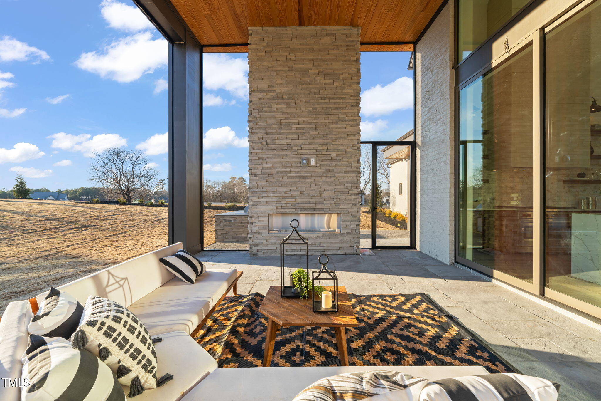 9009 Meadow Pointe Court Wake Forest, NC 27587 - Photo 68 of 76 a balcony view with a couch