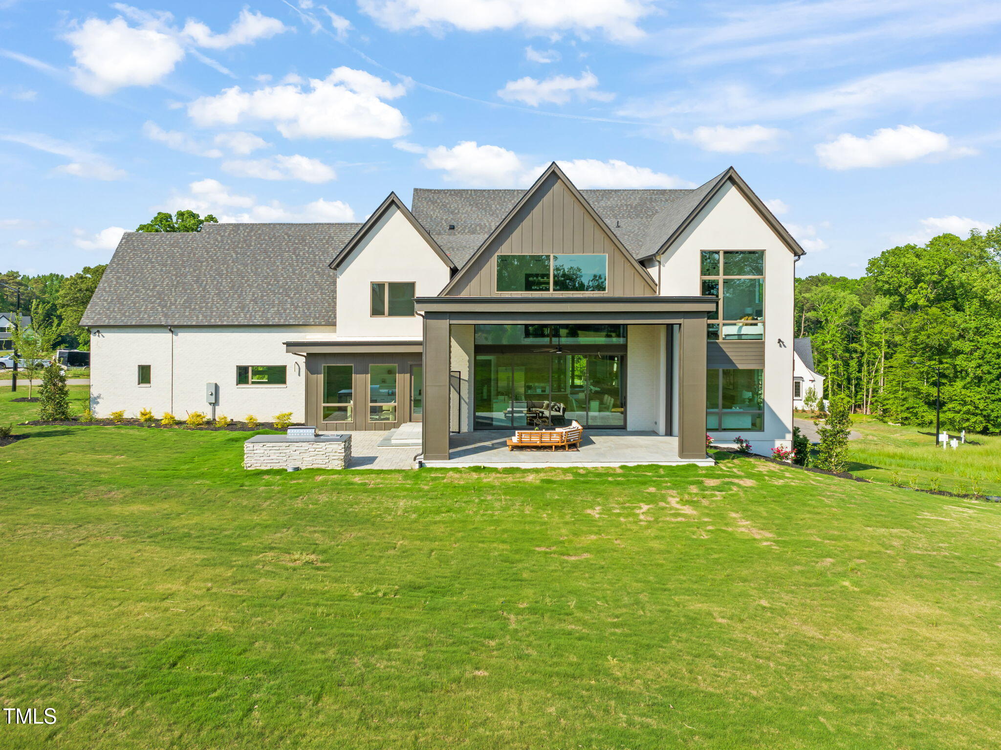 9009 Meadow Pointe Court Wake Forest, NC 27587 - Photo 72 of 76 a front view of a house with garden