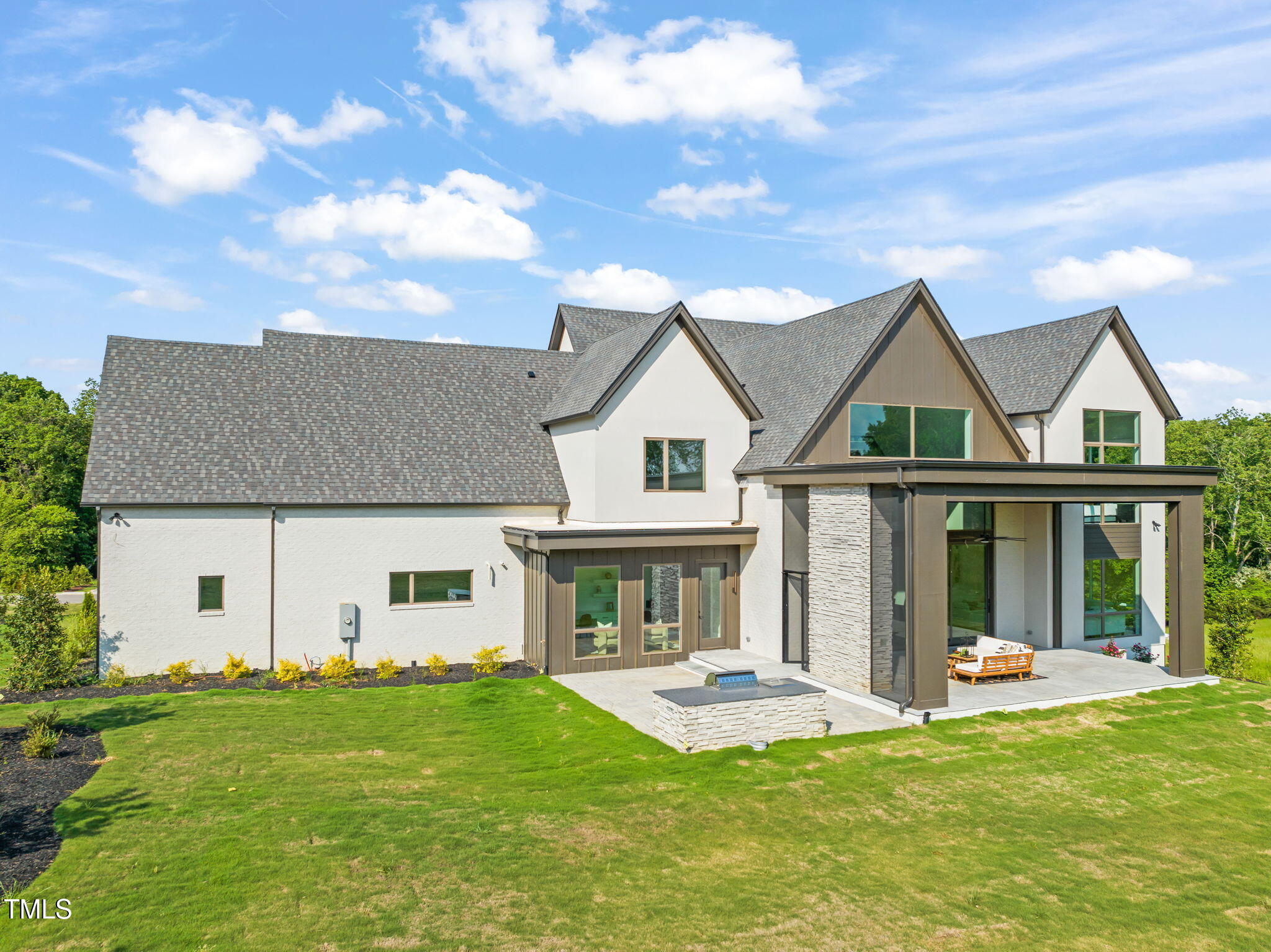 9009 Meadow Pointe Court Wake Forest, NC 27587 - Photo 73 of 76 a view of house with yard and outdoor seating