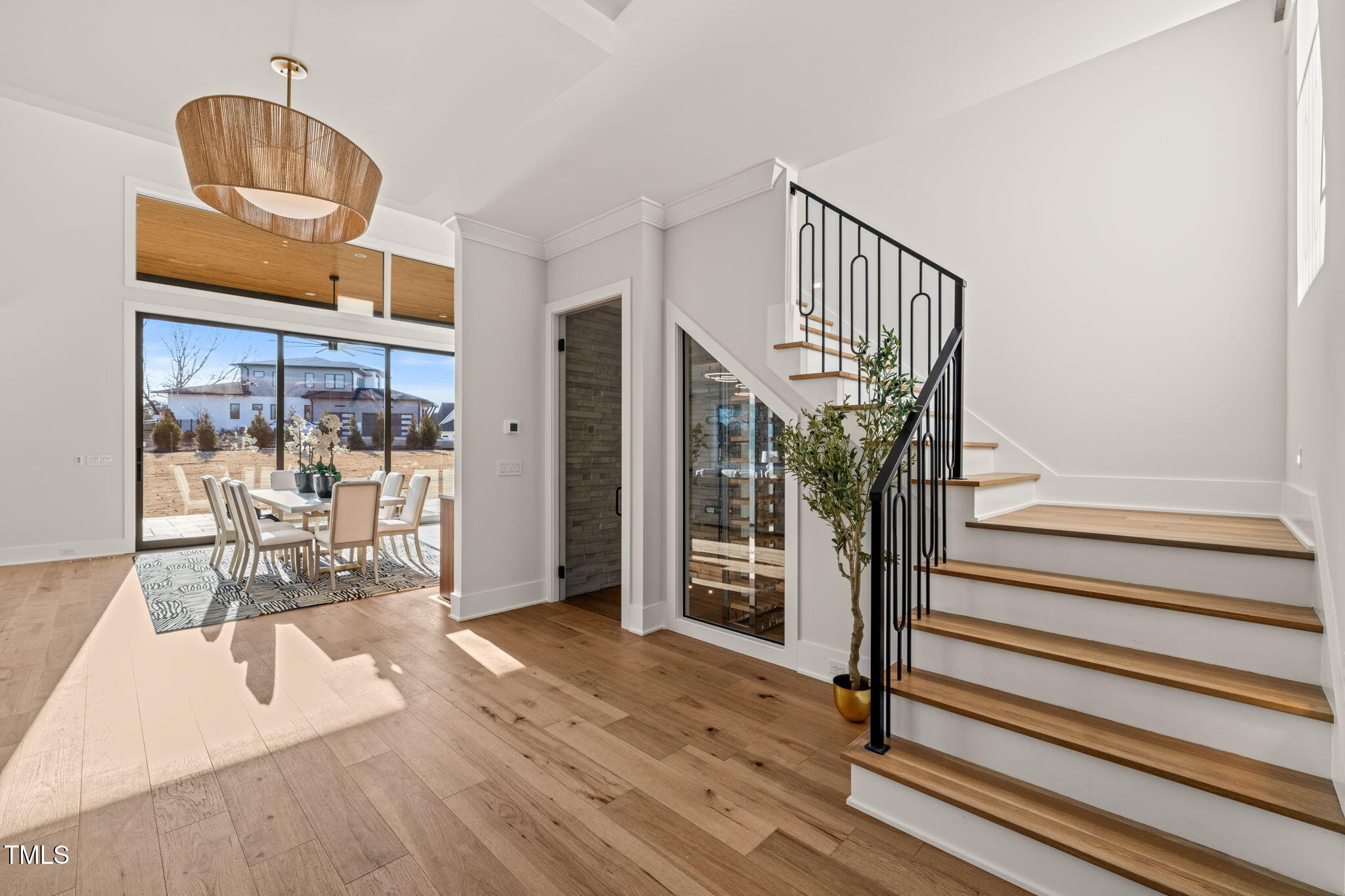 9009 Meadow Pointe Court Wake Forest, NC 27587 - Photo 10 of 76 a view of entryway livingroom and hall with wooden floor