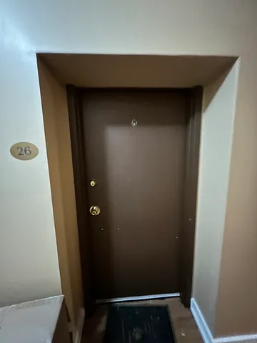 a kitchen with stainless steel appliances granite countertop a stove and a wooden floors