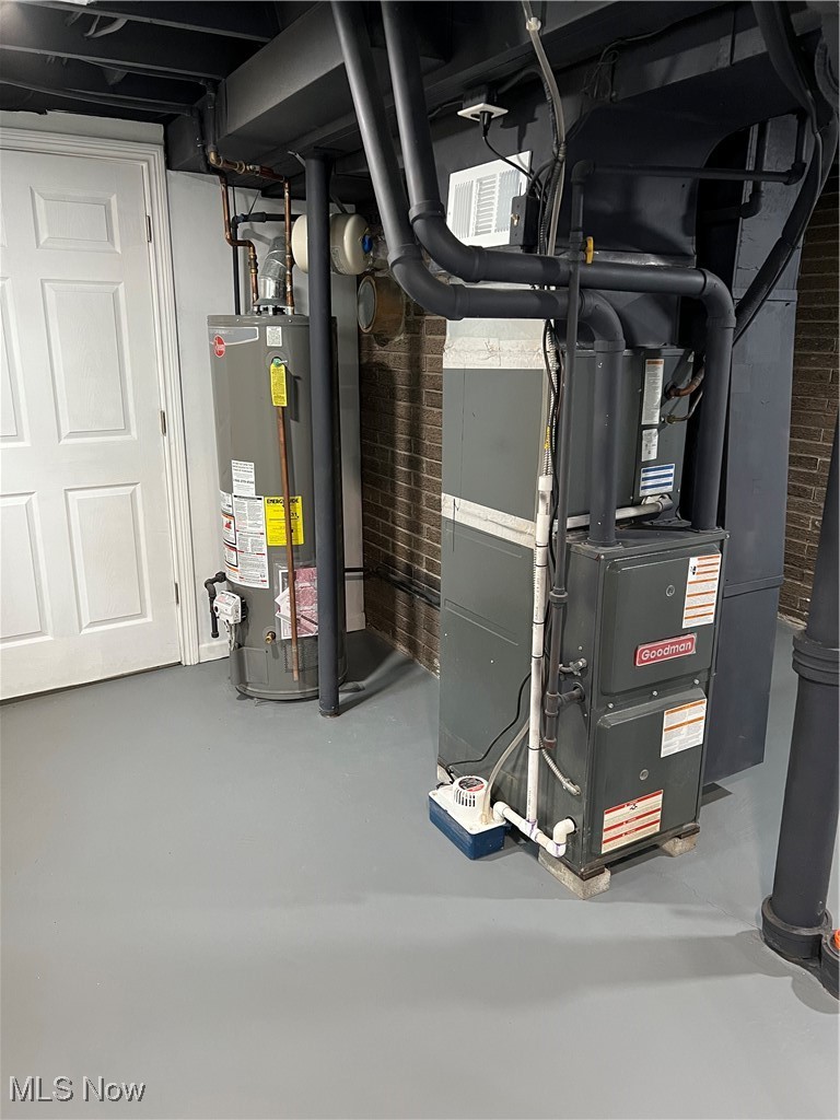 1715 Toepfer Road Akron, OH 44312 - Photo 45 of 49 Utility room with water heater and heating unit