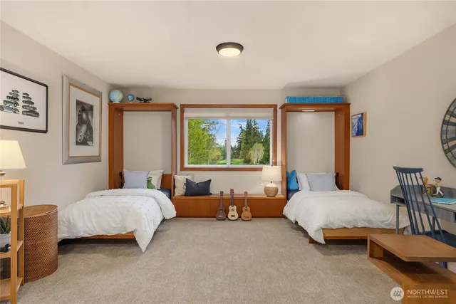 a bedroom with a bed and a couch