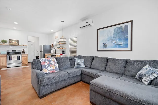 a living room with furniture and a couch