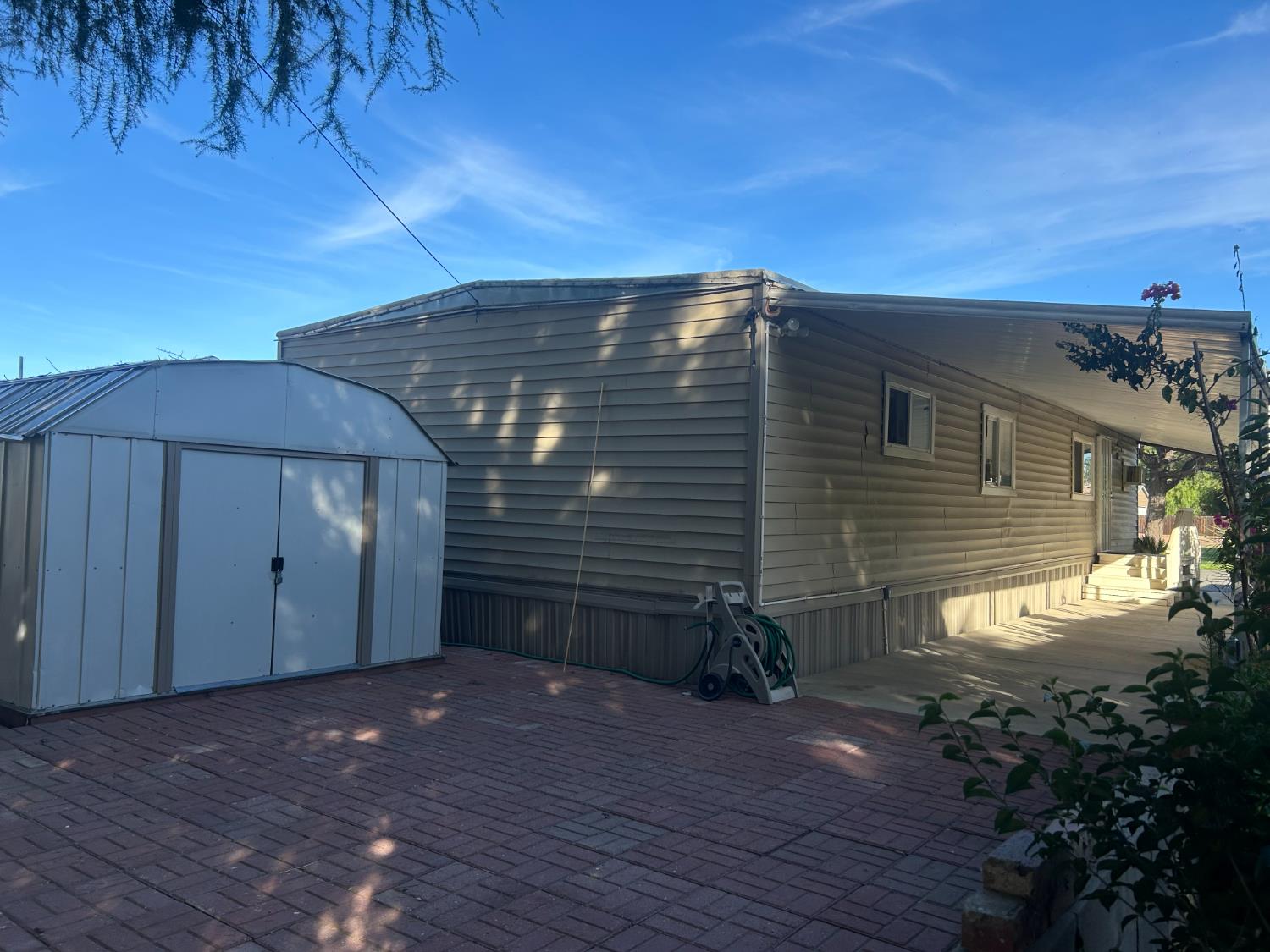 1781 Franklin Road, Unit 59 Yuba City, CA 95993 - Photo 14 of 17 a backyard of a house with lots of green space