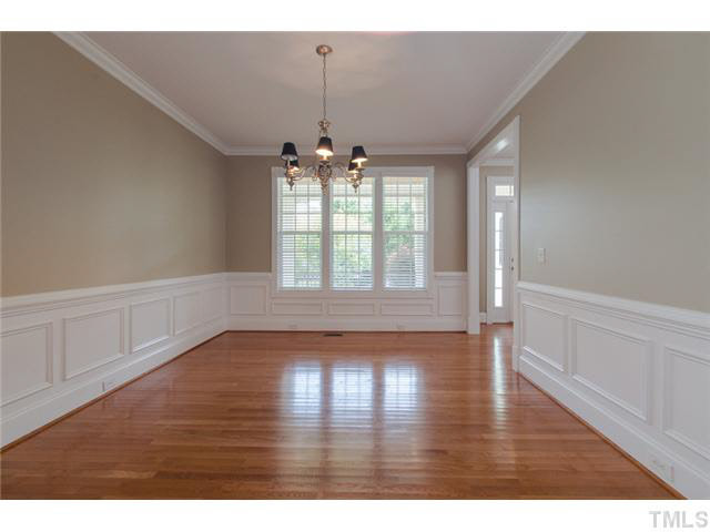 A view of your Dining Room from the Kitchen entrance. Move in ready with Blinds included. Dining Room