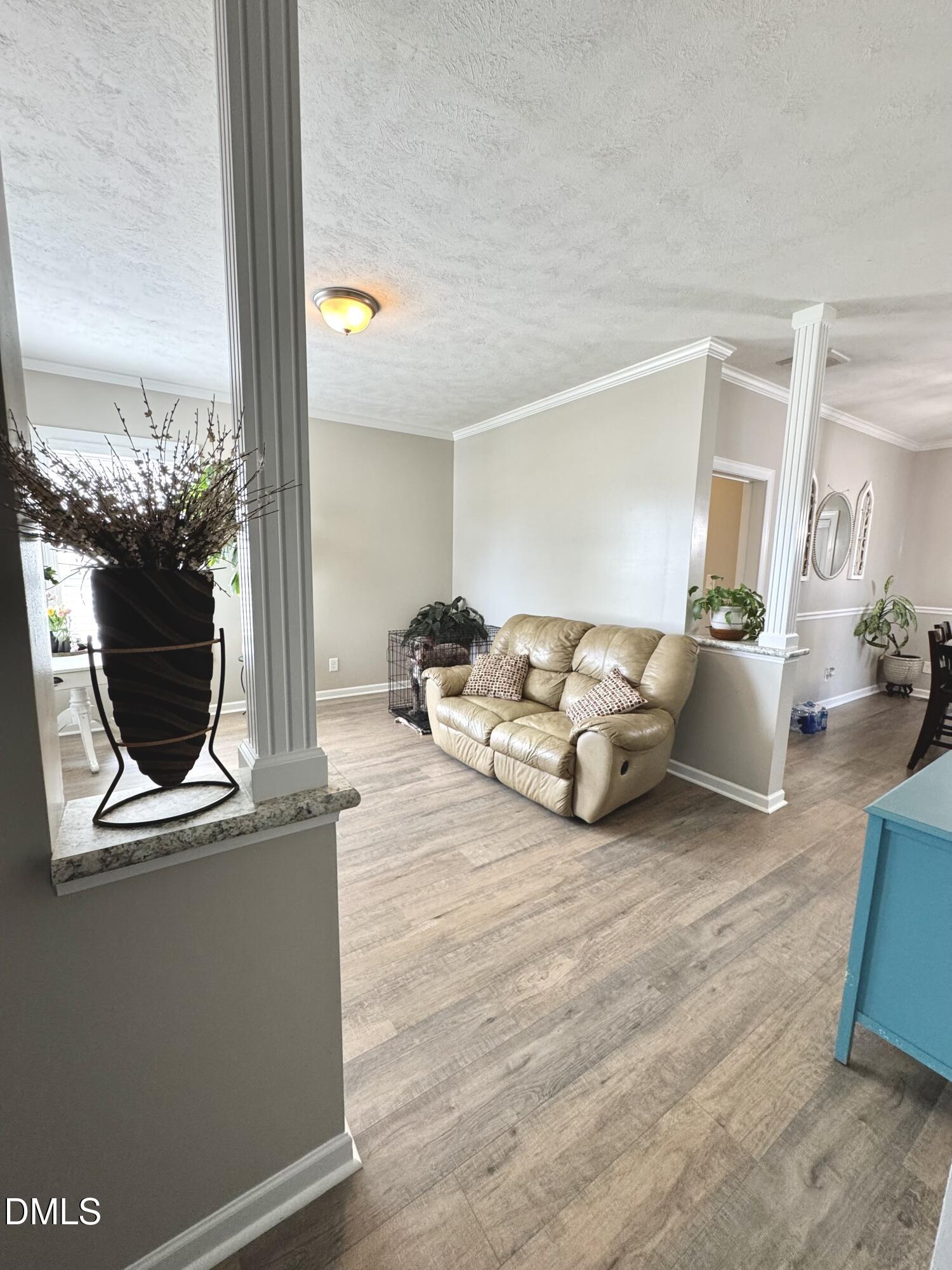 640 Tart Town Road Dunn, NC 28334 - Photo 26 of 71 a living room with furniture and a flat screen tv